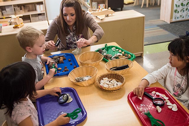 A teacher works with student in the UNT Child Development Lab