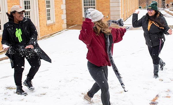 UNT students playing in the snow
