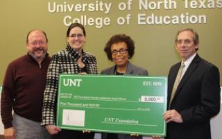 Dr. Barbara Bush is presented the 2020 UNT Foundation Faculty Leadership Award. Pictured from left are Dean Randy Bomer, UNT Provost Dr. Jennifer Cowley, Bush and Al Lockwood with the UNT Foundation.