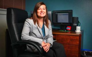 Assistant professor Lauren Eutsler sits at her desk in Matthews Hall on the UNT campus.