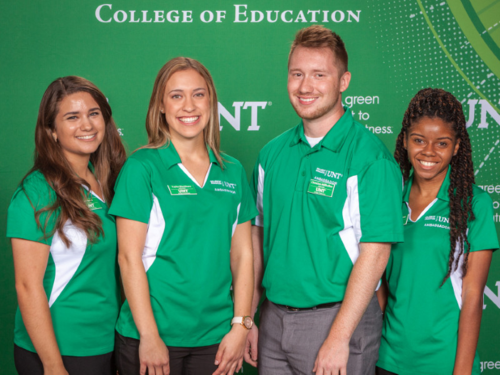 Four student ambassadors at an event.